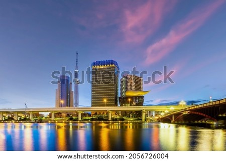 Tokyo skyline in Japan  on the Sumida River at sunset