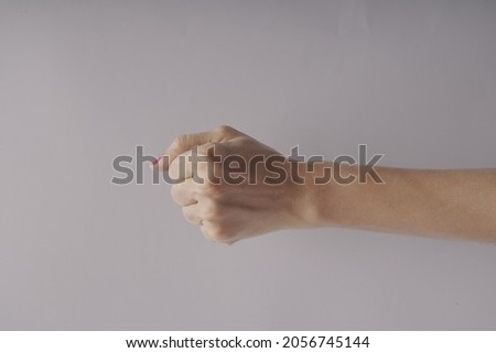 Beautiful woman hand gesture, studio shoot