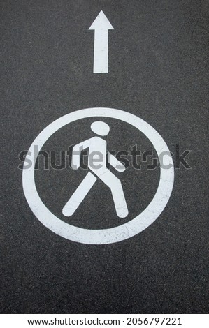 figure of a man on a gray background. road sign.illustration of career growth. driving direction concept