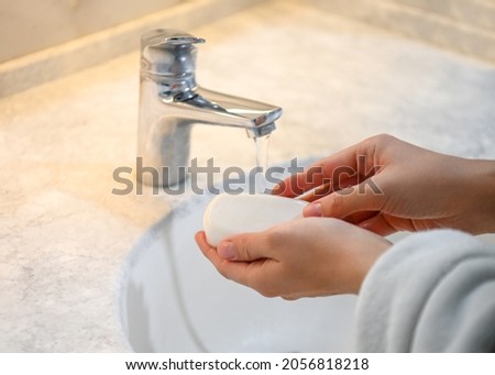 hand washing with a white soap
