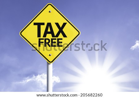 Tax Free road sign with sun background