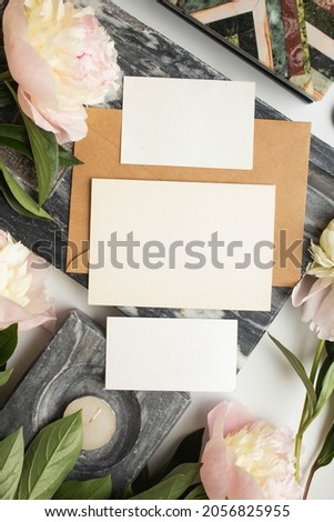 set of invitation wedding cards with peonies and marble