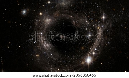 Abstract space wallpaper. Black hole with nebula over stars and cloud fields in outer space. Magnificent glowing night background. Top view. Elements of this image furnished by NASA. Royalty-Free Stock Photo #2056860455