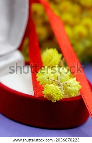 marriage concept with flowers and ring box


