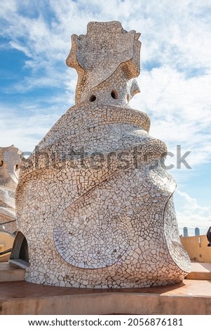  Chimney in the roof of Casa Mila, La Pedrera or "The stone quarry", is a modernist building in Barcelona, Catalonia, Spain. It was the last private residence designed by Antoni Gaudí in Spain Royalty-Free Stock Photo #2056876181