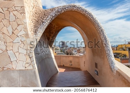 Roof of Casa Mila, La Pedrera or "The stone quarry", is a modernist building in Barcelona, Catalonia, Spain. It was the last private residence designed by Antoni Gaudí in Spain with La Sagrada Familia Royalty-Free Stock Photo #2056876412