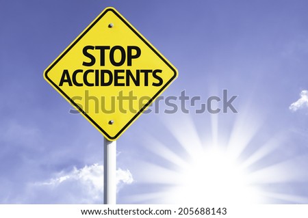 Stop Accidents road sign with sun background