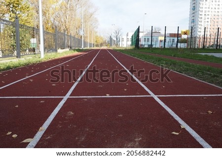 Running track at the stadium on the street. High quality photo