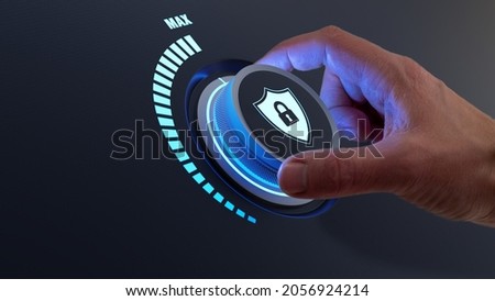 Security concept with person increasing the protection level by turning a knob. Selecting highest defence against cyber attack. Digital crime and data privacy on internet. Cybersecurity. Royalty-Free Stock Photo #2056924214