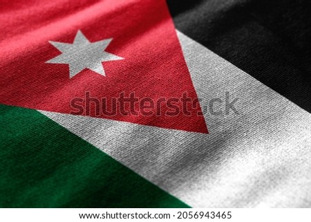 Close up waving flag of Jordan. Concept of Jordan.