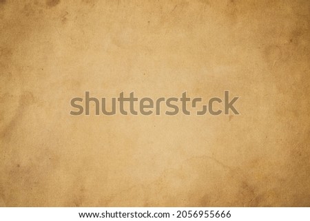 Old vintage paper texture. Brown background. Rustic wallpaper. Retro image