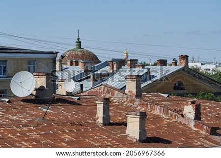 iron rusty roofs of a european city                               