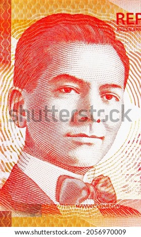 20 Piso banknote, Bank of Philippines, closeup bill fragment shows Effigy of the President Manuel Luis Quezon y Molina, issued 2010