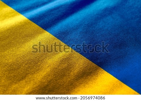 Close up waving flag of Ukraine. Concept of Ukraine. Royalty-Free Stock Photo #2056974086