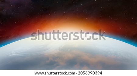 New ice age and Earth covered with snow at sunset "Elements of this image furnished by NASA"