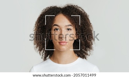 Biometric facial recognition of calm young african american female, isolate on gray background, copy space, panorama. Future tech, face detection, scanning, secure system and id biometric, collage Royalty-Free Stock Photo #2057011499