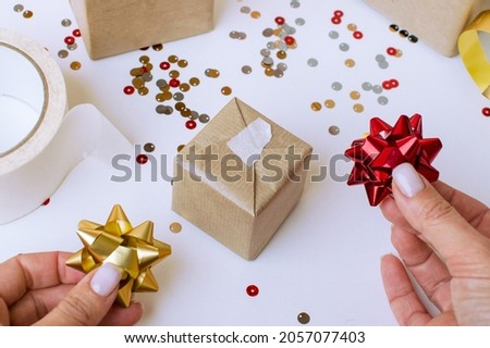 DIY Christmas gift wrapping. White background. The atmosphere of the holiday. High quality photo