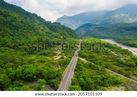 Bird eye view of Taiwan valley -Aerial view and colorful landscape with sky, cloud, hill, river,valley and road; use the drone in morning, shot in Namasia, Kaohsiung, Taiwan.