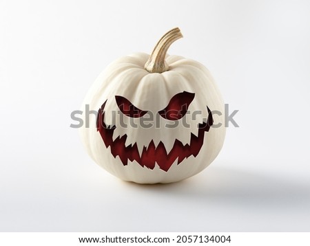 Pumpkin on white background. The main symbol of the Happy Halloween holiday. White pumpkin with smile for your design for the holiday Halloween.