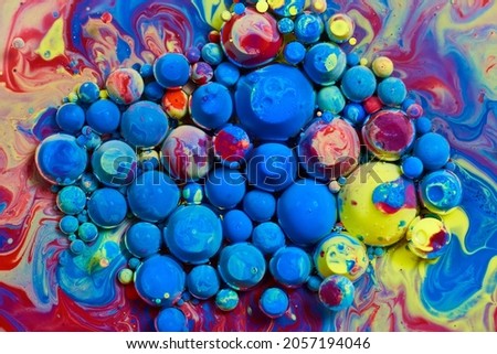 Colorful range of rainbow balls floating on surface Royalty-Free Stock Photo #2057194046