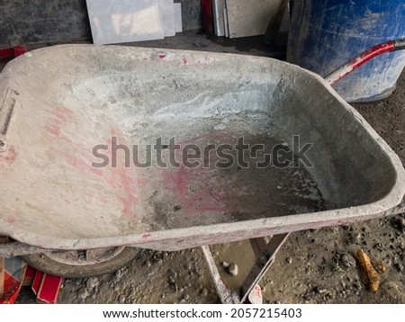 cement cart containing tools and construction materials