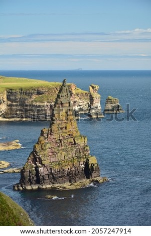 Stacks of Duncansby. Sea stacks near John o' Groats, Caithness, Highland, Scottish Highlands, Scotland, UK Royalty-Free Stock Photo #2057247914