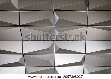 Elegant stainless steel wall in modern urban environment architecture. Textured background. Blank for design. Underlay or undercoat. Copy space for text