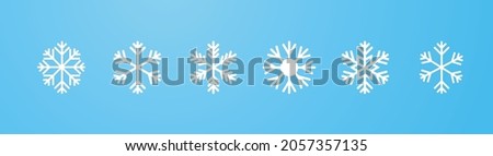 White snowflake set on blue gradient Royalty-Free Stock Photo #2057357135