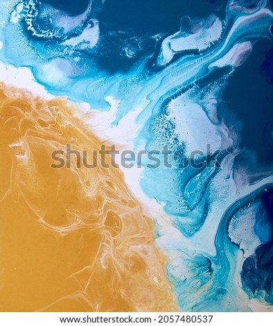 Abstract painting made with acrylic paints using fluid art technique. View from space.                      