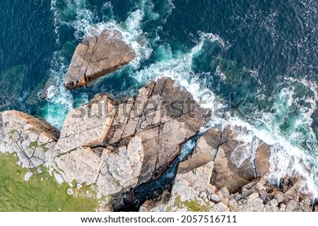 Aerial view of the rocky coastline by Marmeelan and Falcorrib south of Dungloe, County Donegal - Ireland Royalty-Free Stock Photo #2057516711