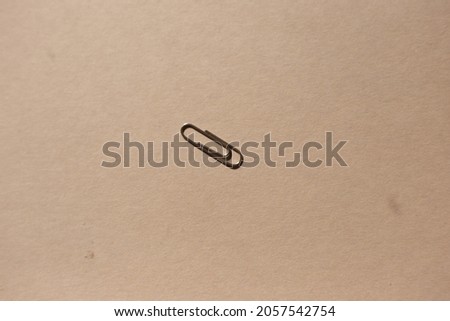 paper clip on craft background