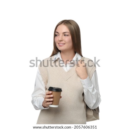 Teenage student with backpack and paper cup of coffee on white background
