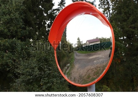 the mirror reflects vilage road