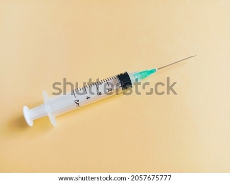 syringe with a dose of 5 ml