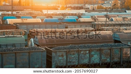 railway depot at sunset. advertising picture. a car with coal. delivery of goods around the world. parking place.