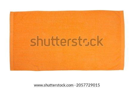 Orange beach towel isolated on white, top view Royalty-Free Stock Photo #2057729015