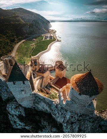 Aerial view of Golubac fortress and Danube river Royalty-Free Stock Photo #2057809925