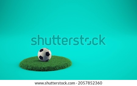 Soccer ball on a grassy plate with cyan background