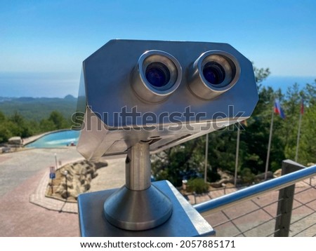 coin operated binoculars for traveler tourists.