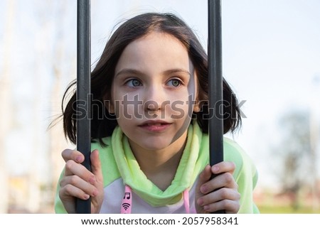 Crop close up portrait of serious sad little girl look aside. Unhappy small child kid orphan feel lonely abandoned outcast or loner miss parents, children drama. Royalty-Free Stock Photo #2057958341