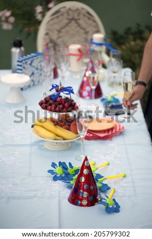 Table arrangement with fruits and different objects