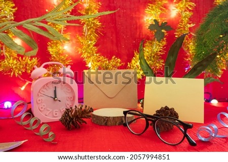 minimalist concept idea displaying products. greeting card on christmas and new year background
