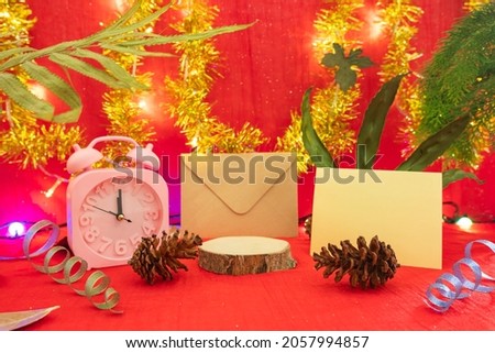 minimalist concept idea displaying products. greeting card on christmas and new year background
