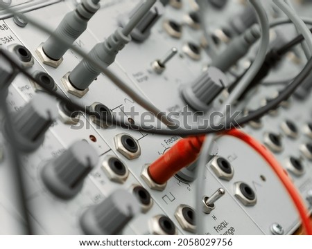 closeup of an analog modulare synthesyzer in a recording studio Royalty-Free Stock Photo #2058029756