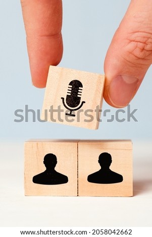 Podcast concept featuring microphone and persona icons.