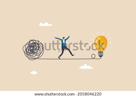 Simplify idea to find solution, thinking process or creativity to solve problem, discover easy way to understand concept, smart businessman walking away from mess chaos line to simple lightbulb idea. Royalty-Free Stock Photo #2058046220