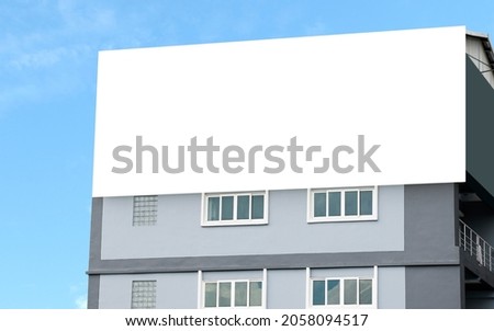 Outdoor billboard on building with white background mock up. clipping path