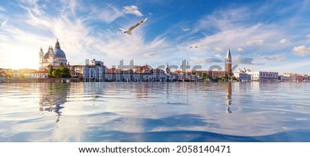 Famous Salute Church, San Marco and Doge's Palace at sunset, Venice, Italy Royalty-Free Stock Photo #2058140471