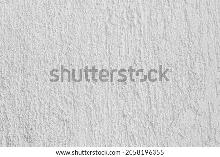 Photo texture of gray colored concrete stucco wall.