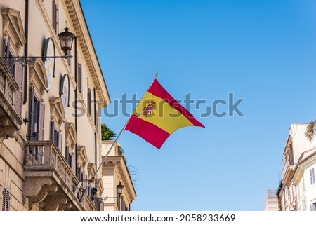 Waving spanish flag on Spanish embassy in Italy - the Palace of Spain, Monaldeschi Palace (Palazzo di Spagna), baroque palace that houses the Embassy of Spain to the Holy See in Rome, Lazio, Italy Royalty-Free Stock Photo #2058233669
